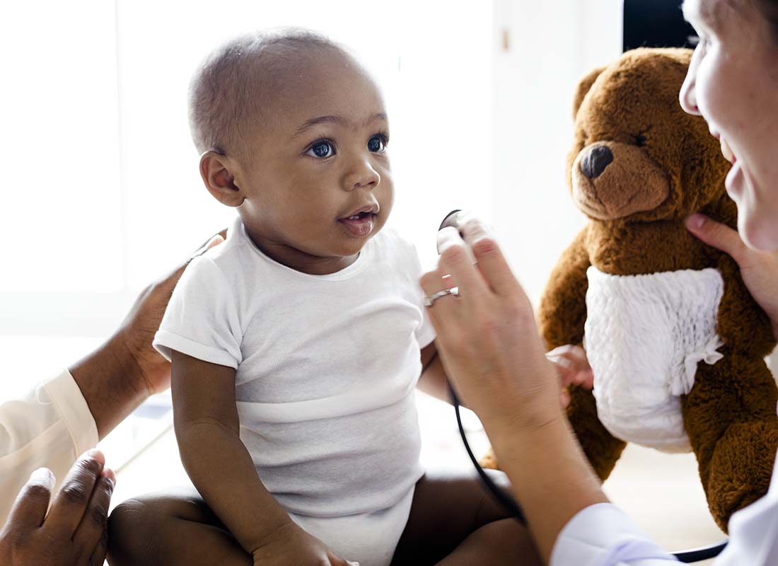 Individual Health Insurance - Baby during a Doctor Visit for a Wellness Checkup